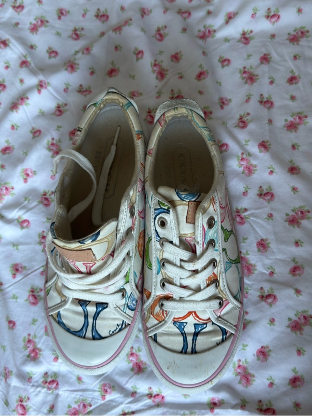 2000s Coach white with blue yellow orange green and pink logo all over